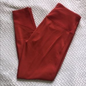 A deep orange 90° degree by reflex leggings, in great condition!